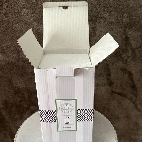 Retired Scentsy Nevermore Warmer Wrap Retired Black Metal New with tag
Wax - Picture 5 of 7